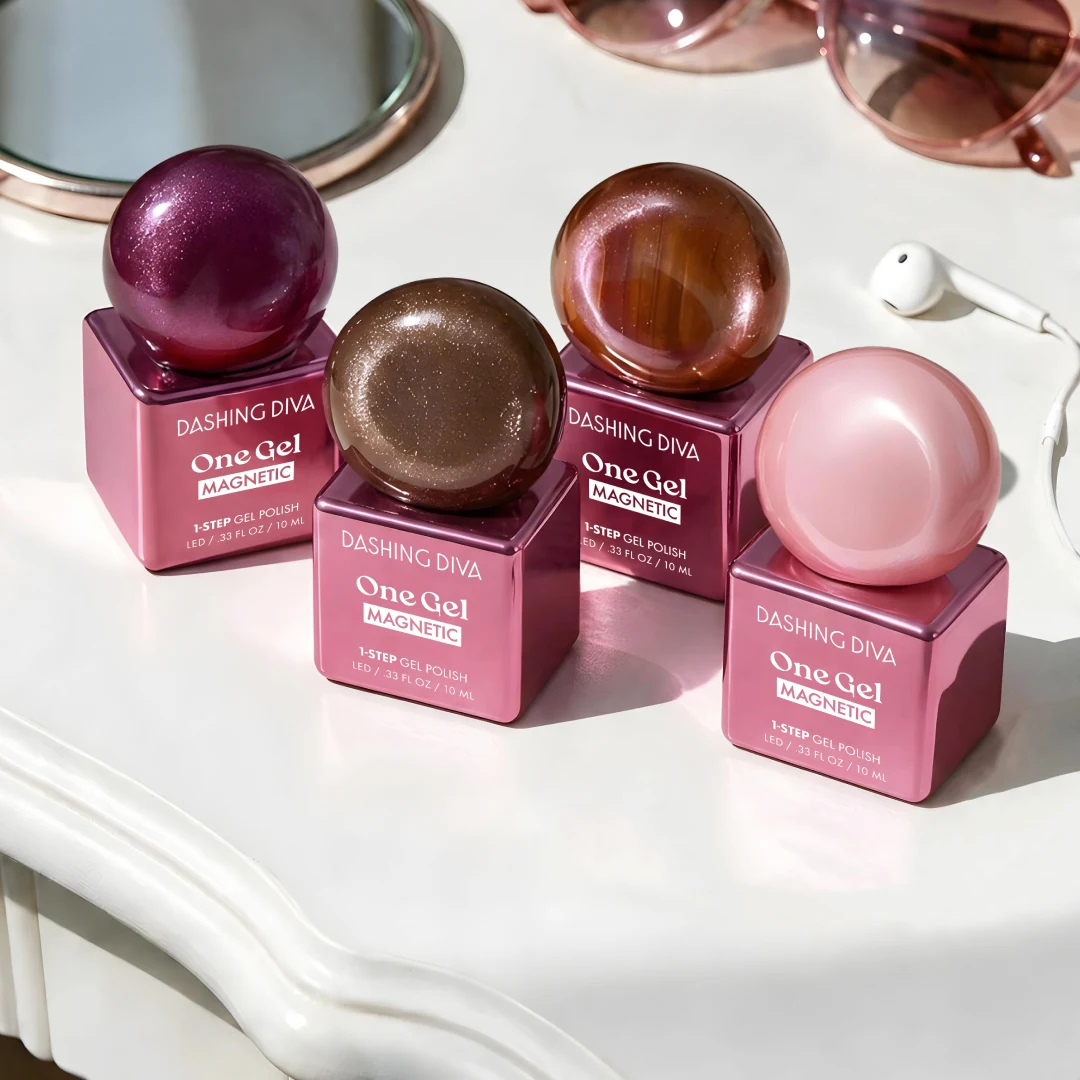 Dashing Diva nail color products arranged on a sunlit table